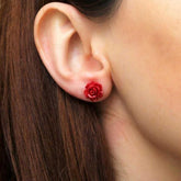 Boucles d'oreilles en argent avec rose rouge